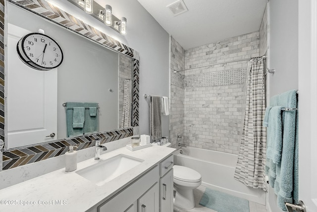 full bathroom with toilet, shower / bath combo, visible vents, and vanity