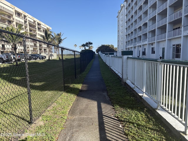 view of property's community with a yard