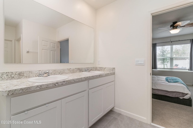 bathroom featuring vanity, tile patterned floors, and ceiling fan