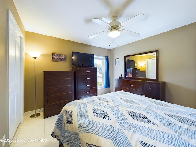 bedroom with light tile patterned floors and ceiling fan