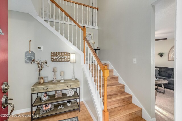 828 Parkwood Ave, Titusville, FL 32796 - staircase with wood finished floors and baseboards