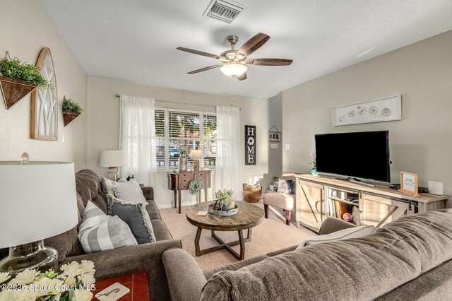 828 Parkwood Ave, Titusville, FL 32796 - carpeted living room with ceiling fan