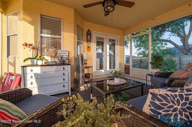 828 Parkwood Ave, Titusville, FL 32796 - sunroom / solarium featuring french doors, a ceiling fan, and an outdoor hangout area