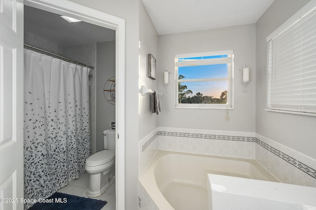 828 Parkwood Ave, Titusville, FL 32796 - bathroom with a garden tub, toilet, tile patterned floors, and a shower with curtain