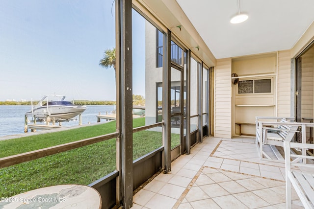 sunroom with a water view