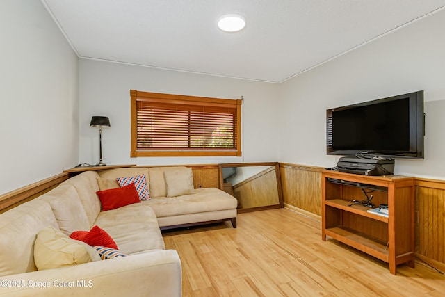 living room with light hardwood / wood-style flooring