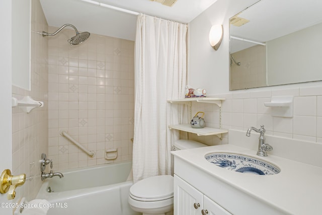 full bathroom featuring tile walls, shower / bath combination with curtain, backsplash, vanity, and toilet