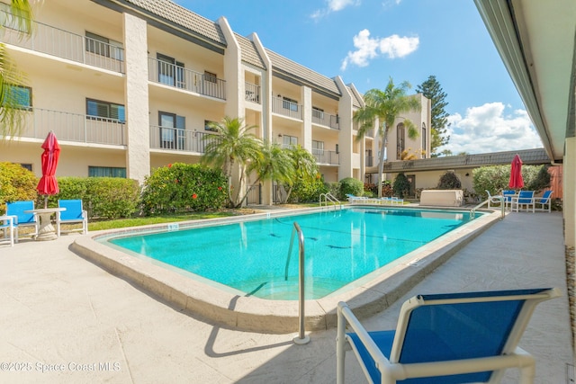 view of pool with a patio area