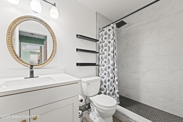 bathroom featuring vanity, toilet, and a shower with shower curtain