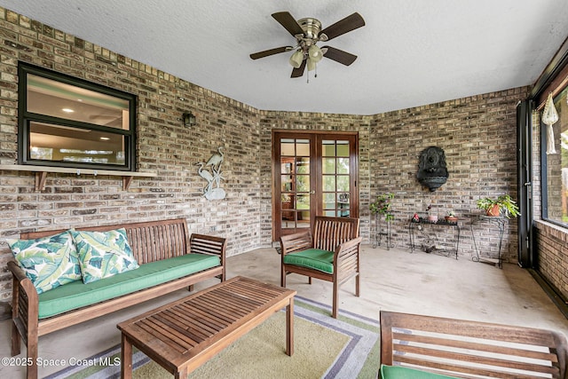 view of patio with an outdoor hangout area, french doors, and ceiling fan