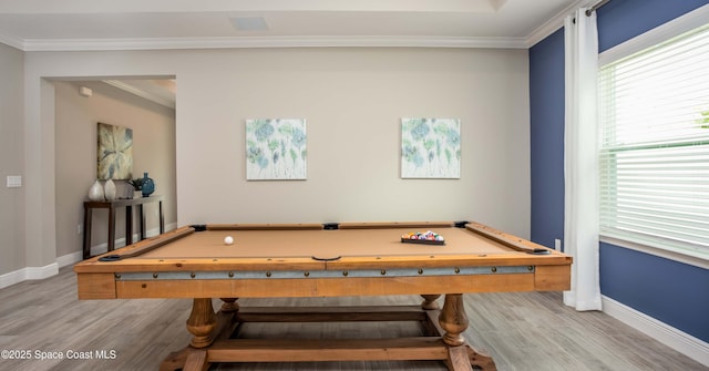 rec room featuring billiards, ornamental molding, and light hardwood / wood-style floors