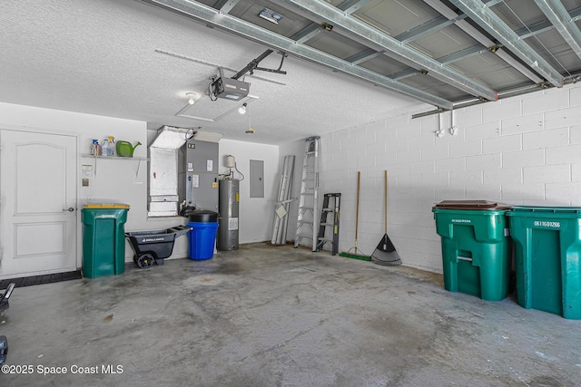 garage with a garage door opener, electric panel, and electric water heater