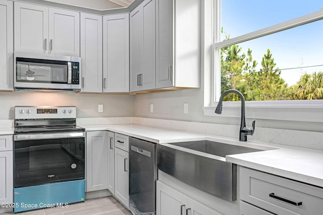 kitchen with stainless steel appliances and a sink