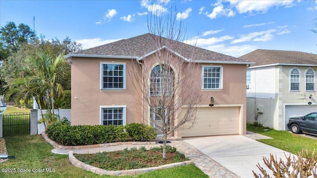 view of front of property with a garage