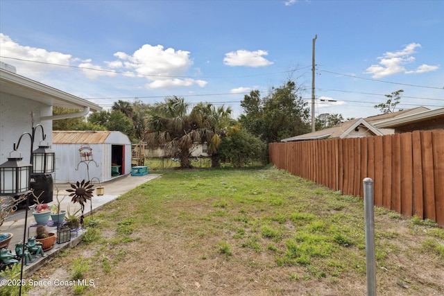 225 Court St, Titusville, FL 32780 - view of yard featuring an outbuilding