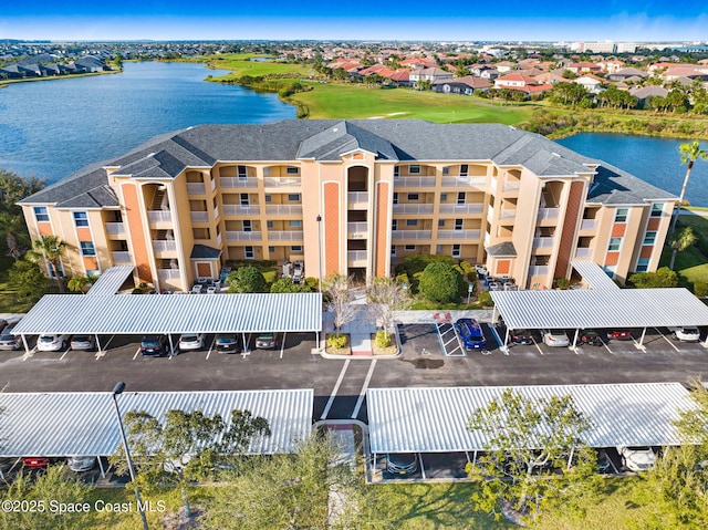 drone / aerial view with a water view