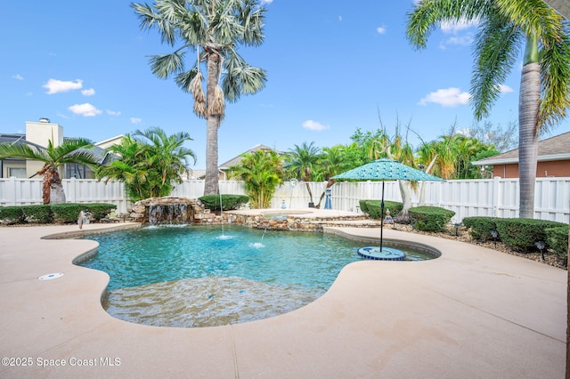 view of swimming pool with a patio, a fenced backyard, a fenced in pool, and an in ground hot tub