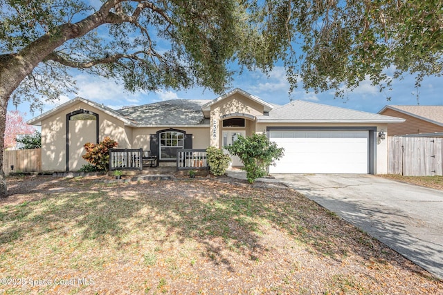 single story home featuring a garage