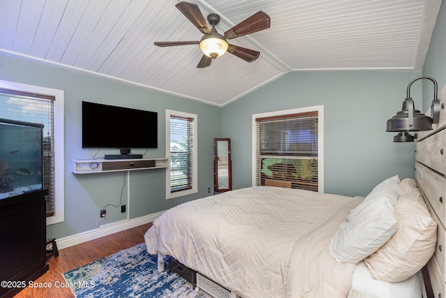 bedroom with vaulted ceiling, hardwood / wood-style floors, wood ceiling, and ceiling fan