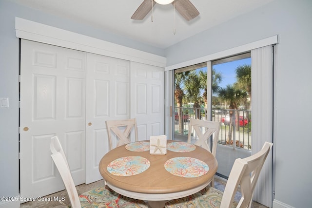 dining space with a ceiling fan