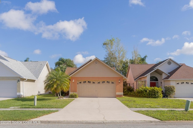 ranch-style house with a garage and a front yard