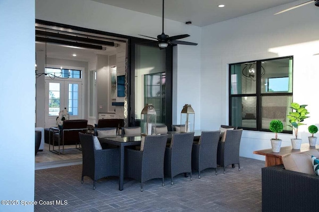 view of patio with french doors and ceiling fan