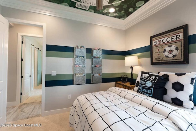 carpeted bedroom featuring ornamental molding