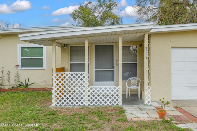 property entrance with a garage