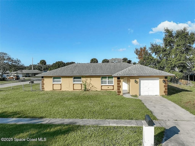 single story home featuring a garage and a front lawn