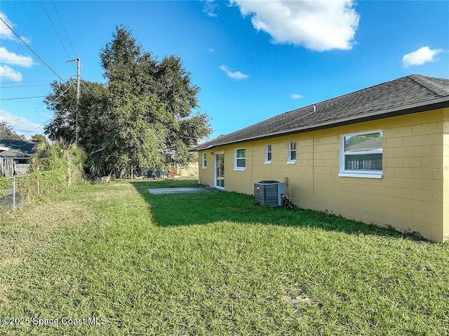 view of yard featuring central AC