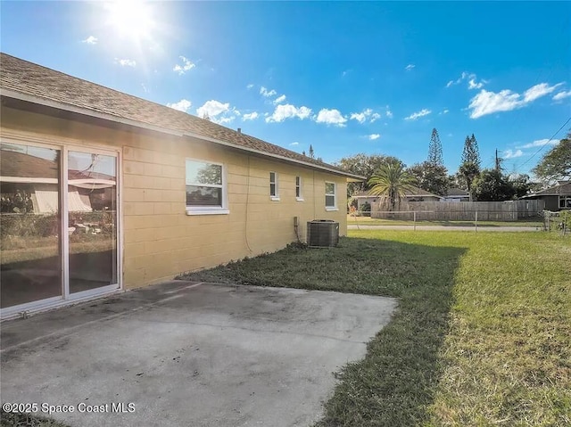 exterior space featuring cooling unit and a patio