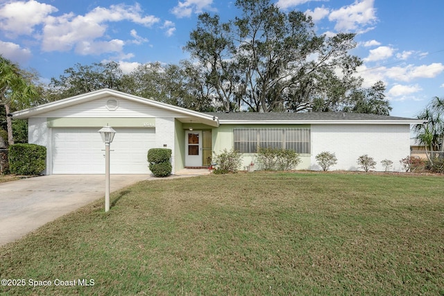 single story home featuring a garage and a front yard