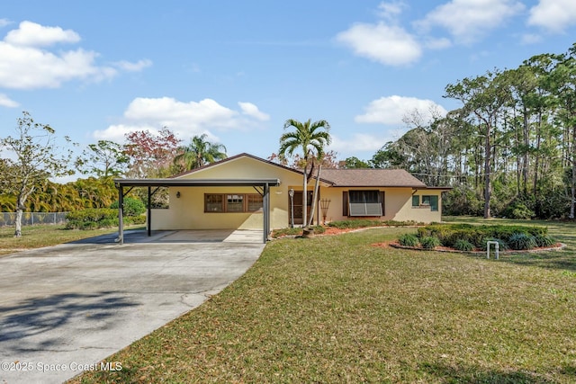 ranch-style home with a carport and a front yard