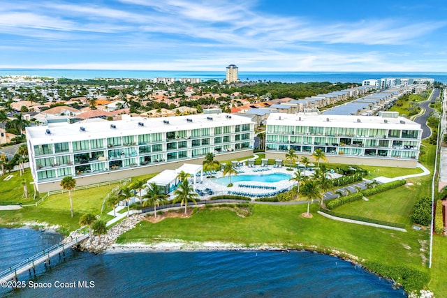 birds eye view of property featuring a water view