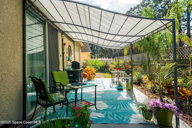 view of patio / terrace featuring a pergola