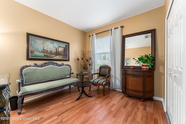 living area featuring light hardwood / wood-style flooring