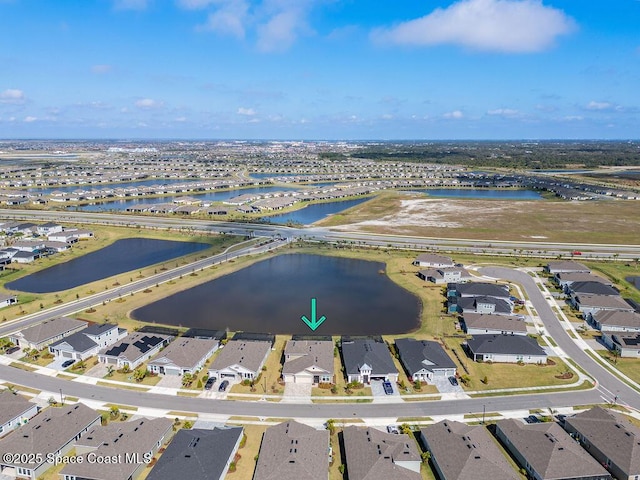 drone / aerial view featuring a water view