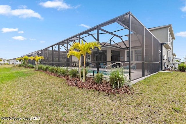 exterior space featuring a lanai, a lawn, and a patio