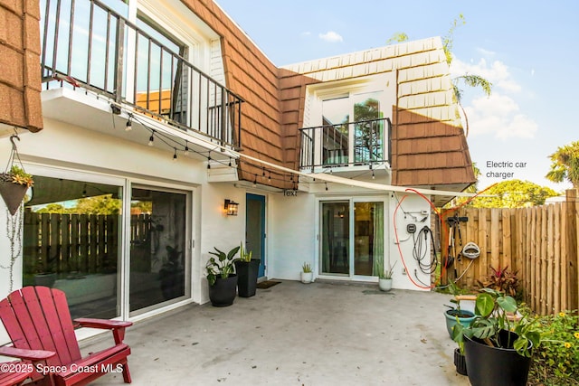 back of house featuring a patio area