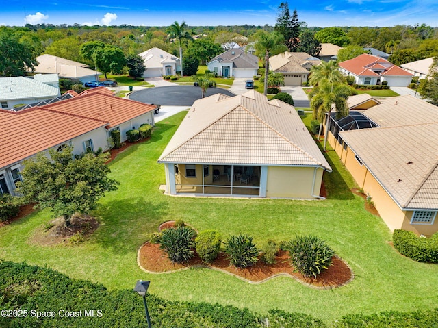 drone / aerial view with a residential view