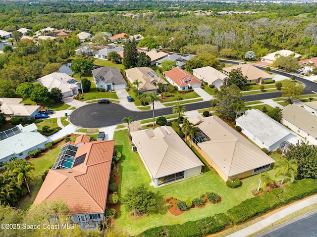 birds eye view of property with a residential view