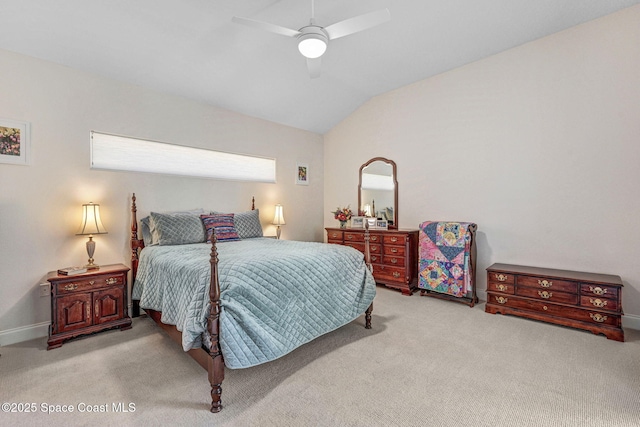 bedroom with lofted ceiling, carpet flooring, and ceiling fan