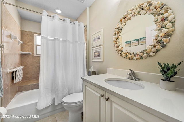 bathroom with shower / tub combo with curtain, vanity, toilet, and tile patterned floors