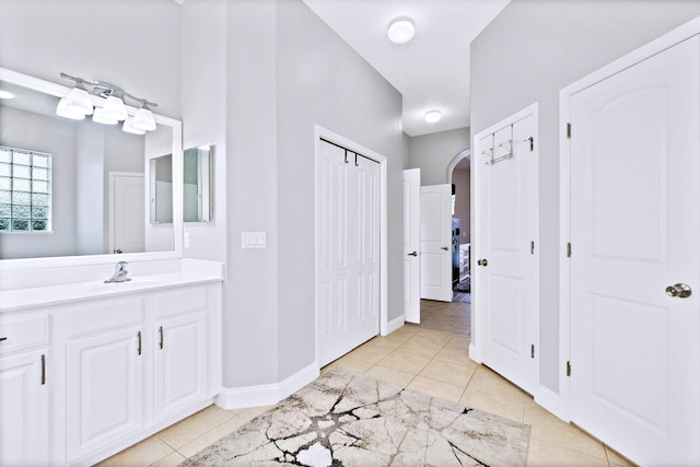 bathroom with vanity and tile patterned flooring