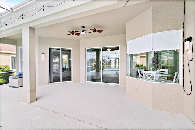 view of patio / terrace with ceiling fan