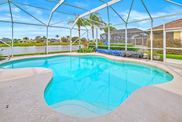 view of pool featuring a water view, a lanai, and a patio