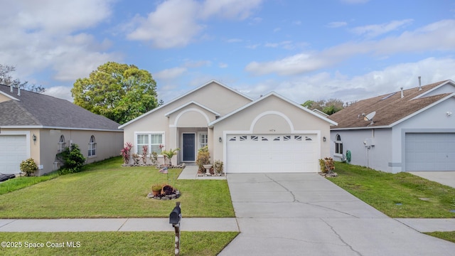 single story home with a front lawn and a garage