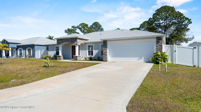 view of front of home with a garage and a front lawn