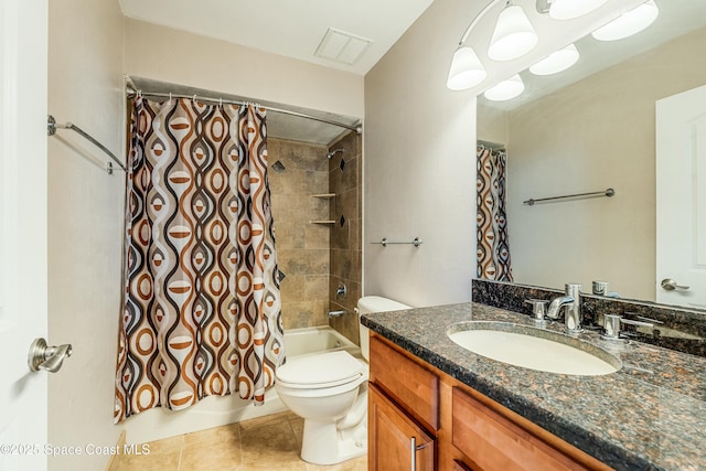 full bathroom with vanity, shower / tub combo with curtain, tile patterned floors, and toilet