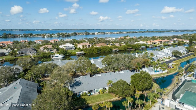 bird's eye view with a water view